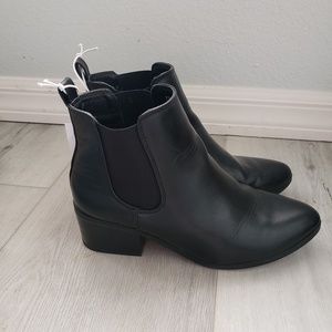 A New Day black boot